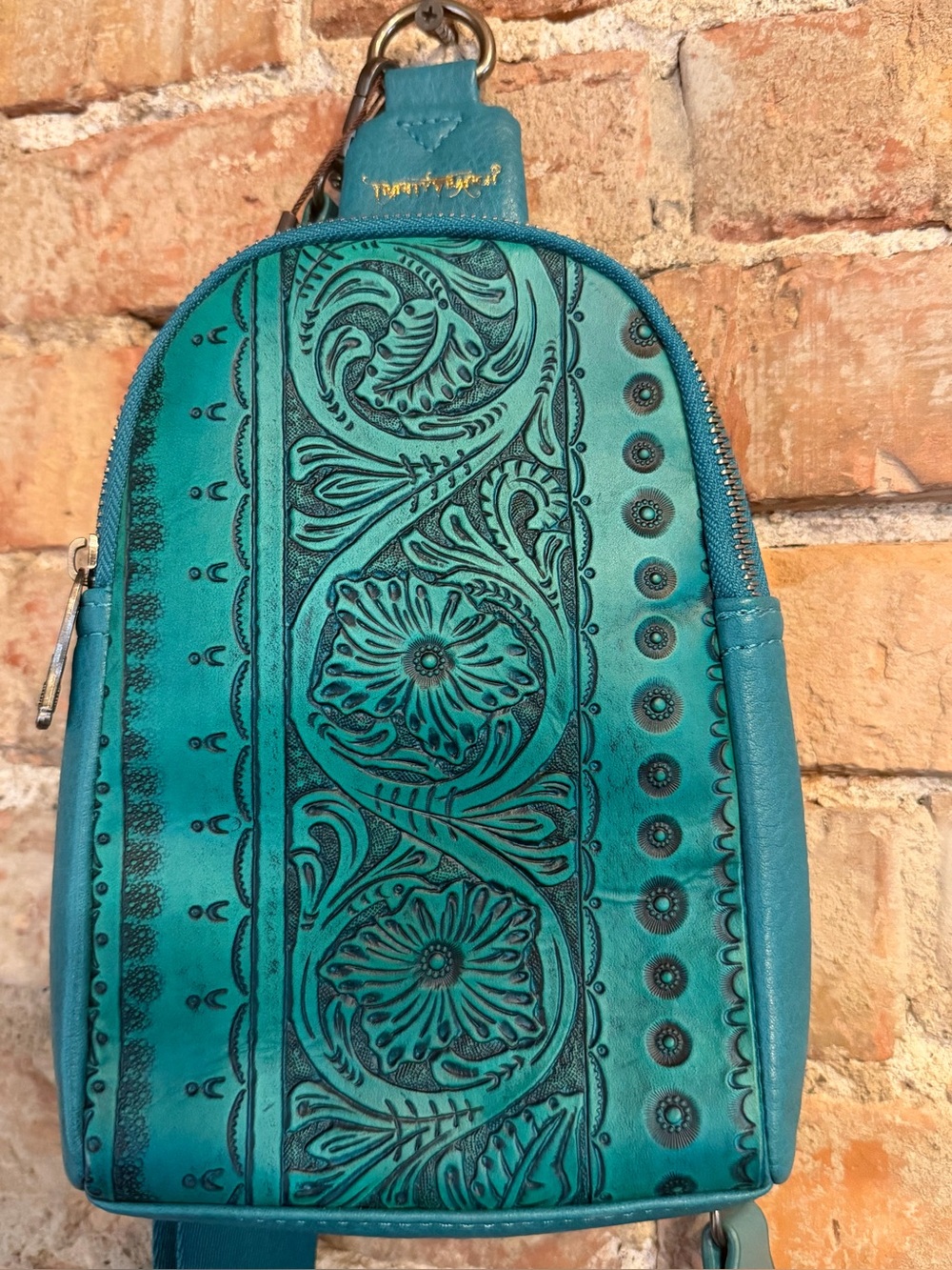 Turquoise sling bag
